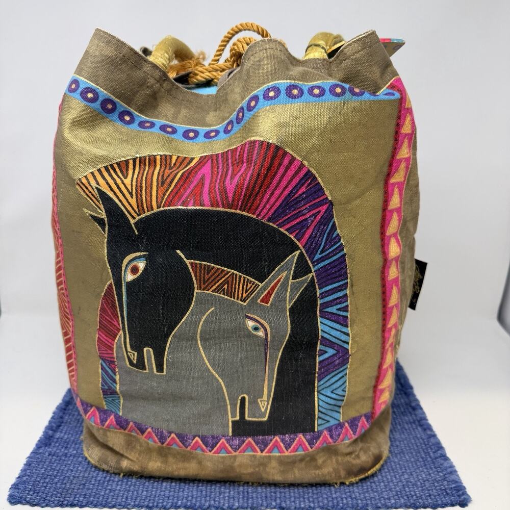 Laurel Burch tote bag features the brand's iconic "Embracing Horses"